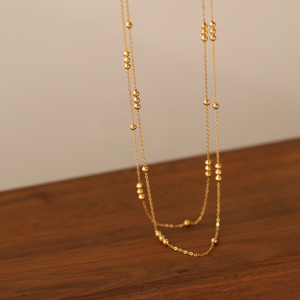 Gold best sale beaded necklace