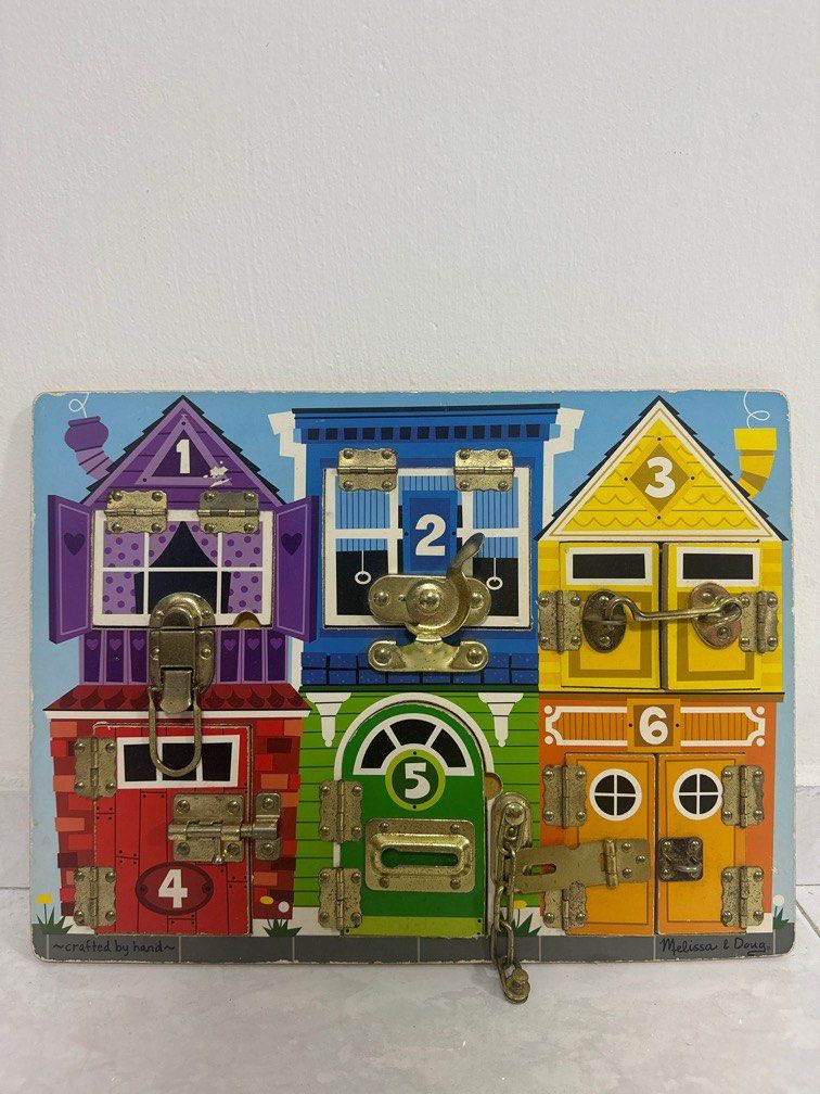 Melissa & doug top latches wooden activity board