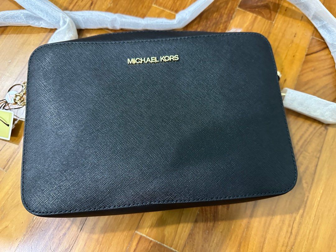 Michael kor sling bag deals