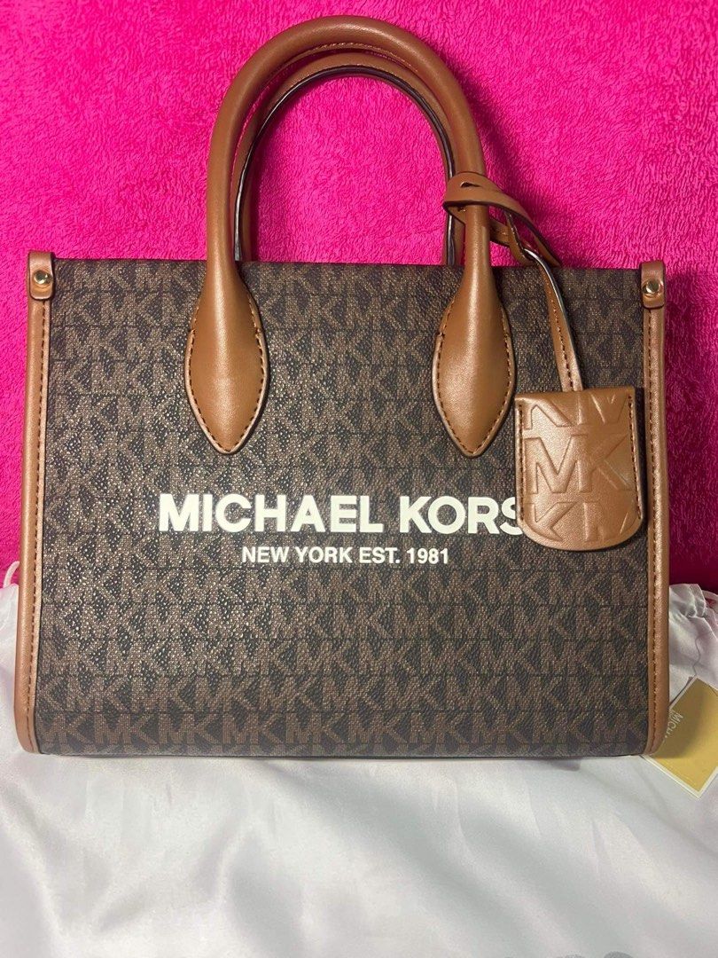 REPRICED—PRELOVED AUTHENTIC MICHAEL KORS MIRELLA BAG (Category: Luxury Bags & Wallets) located in Quezon City. Submitted by mrsp_28 (Listing ID 1271219066, Image 2). Description: Slightly-used Authentic Michael Kors Mirella Bag with Sling Size: Small Color: Brown Monogram RFS: Decluttering MOP: BDO/BPI/GCASH.