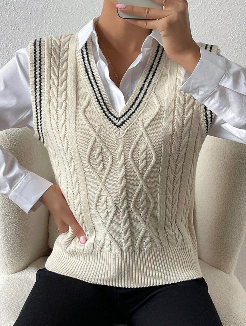 KOREAN KNIT SWEATER VEST (Category: Others Tops) located in Leyte. Submitted by dey_shell (Listing ID 1271431320, Image 1). Description: Bought from Shein for ₱546. Condition: never worn but tag was already removed RFS: not my style Sizes (according to Shein size chart): •Shoulder - 35cm •Length - 53cm •Bust - 94cm.