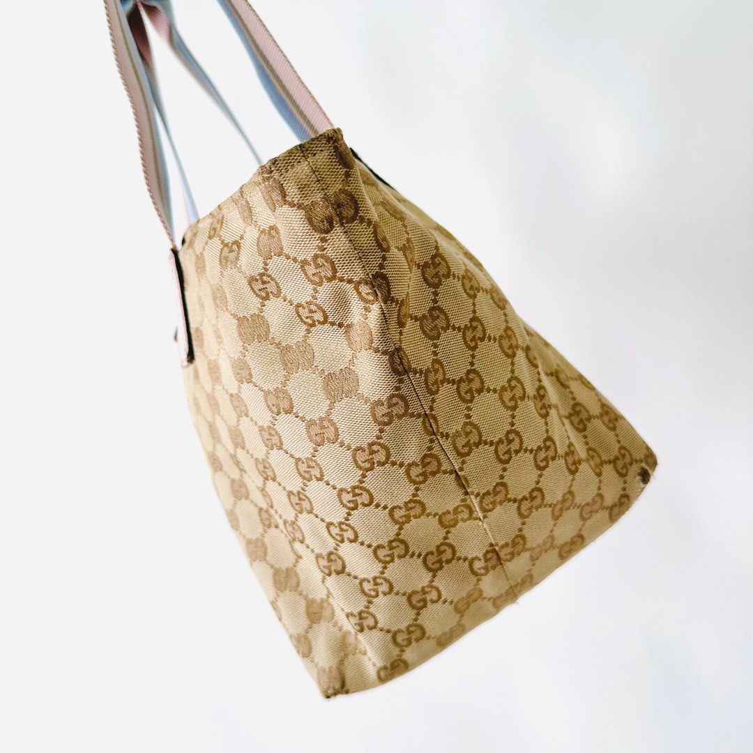 Monogram logo hotsell shoulder zip bag