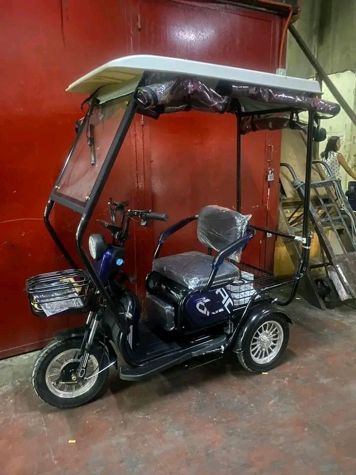 super fashion transformer (Category: Bicycles) located in Manila. Submitted by saguittarian06 (Listing ID 1271255163, Image 1). Description: NEW ARRIVAL Super FASHION ebike 3 wheels,2 rows with ROOF! INCLUSIONS: Unit with complete accessories Side mirror with trapal automatic wiper Specs. With wiper With panel With anti theft alarm 3 seater Front & Back Basket Battery Lead Acid 48v 20AH 600Watts 40-50Km Range 40-60Km/H Speed 10*-8 Tubeless 350kg 