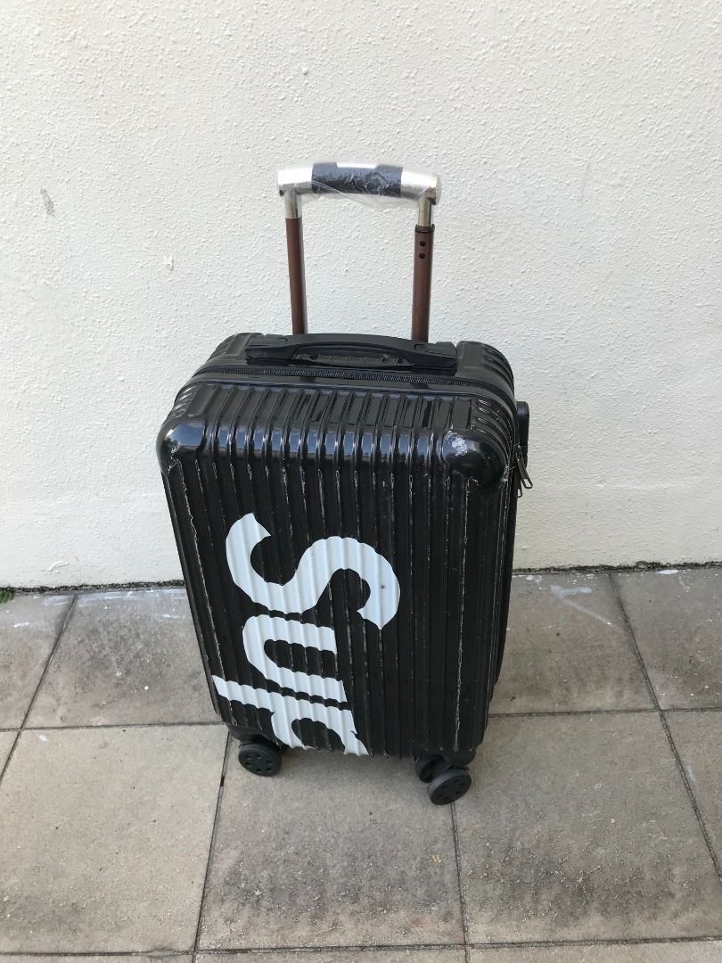 Supreme black suitcase discount