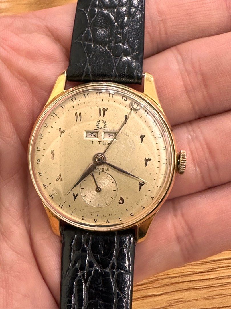 Titus on sale gold watch