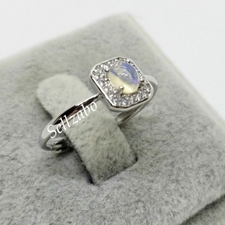 White stone in outlet ring