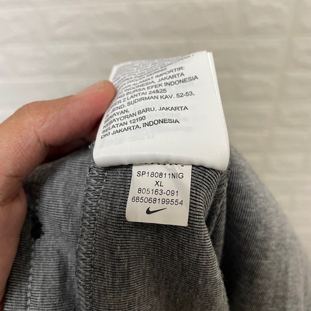 dark gray nike tech fleece