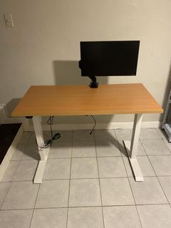 Height adjustable desk with Samsung monitor