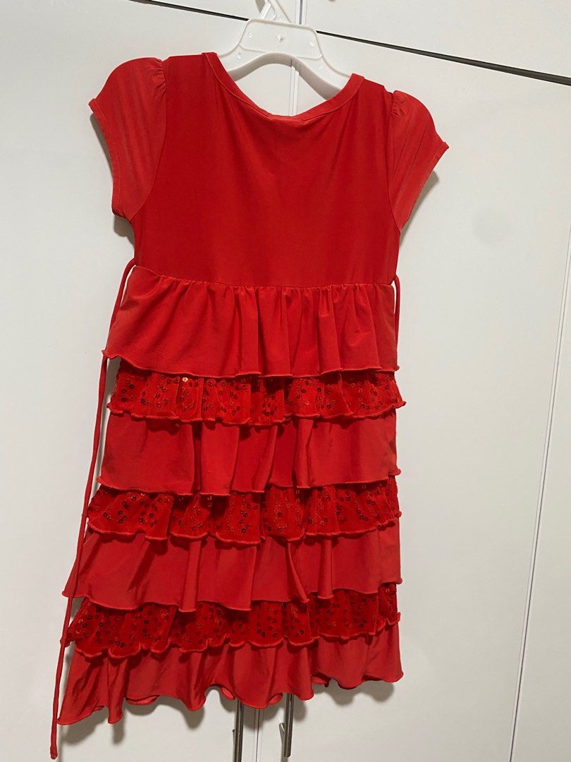 Justice red layered sequin dress for 7yo (Category: Babies & Kids Fashion) located in Paranaque City. Submitted by stuffnshare (Listing ID 1271603844, Image 3). Description: Silky/smooth.