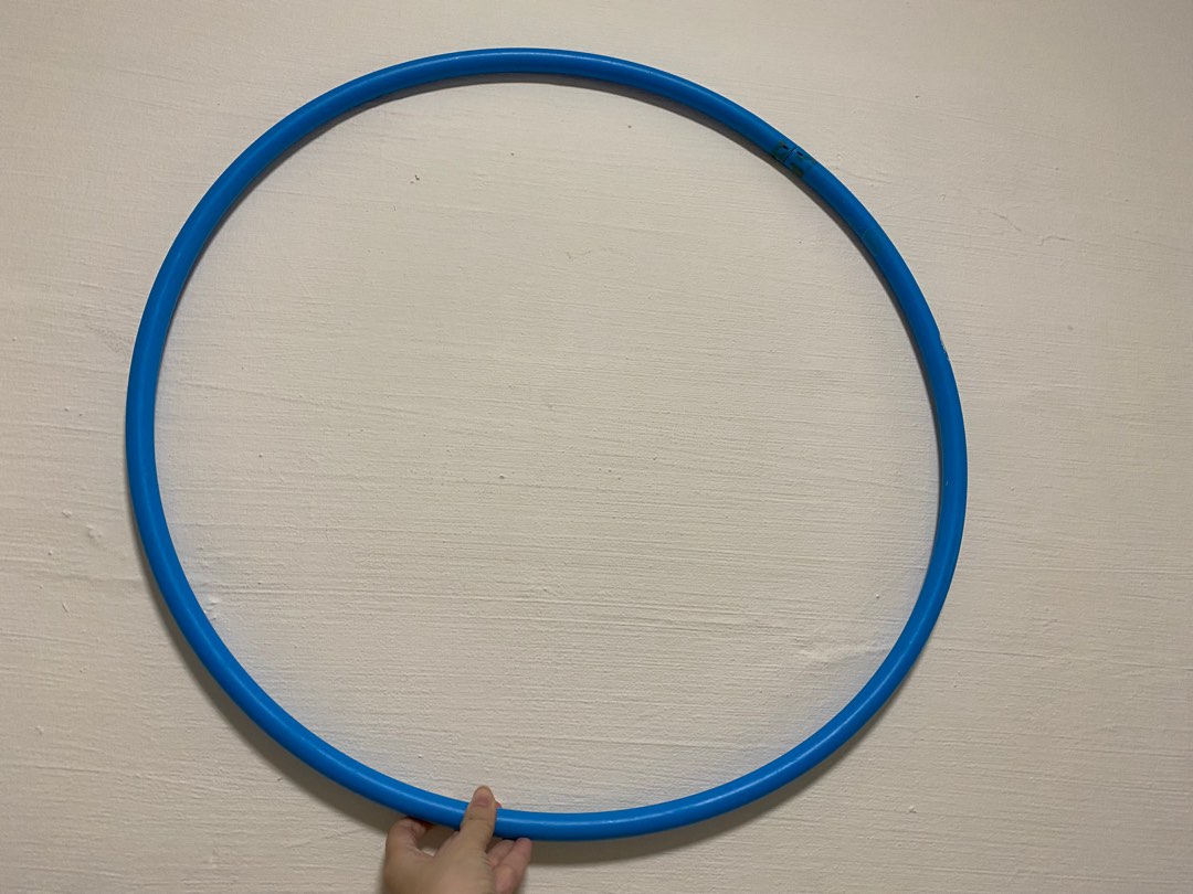 Lightly used blue Hula Hoop with beads inside, Sports Equipment