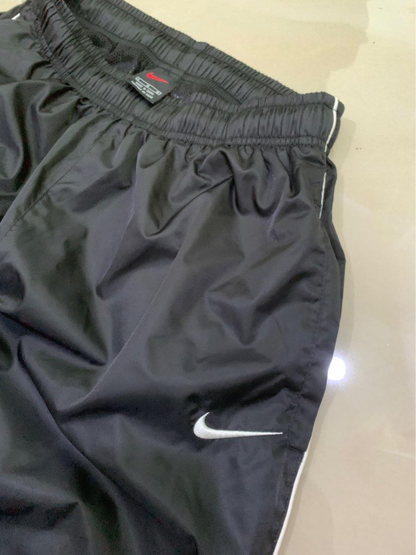 Nike track pant waterproof Men s Fashion Bottoms Joggers on
