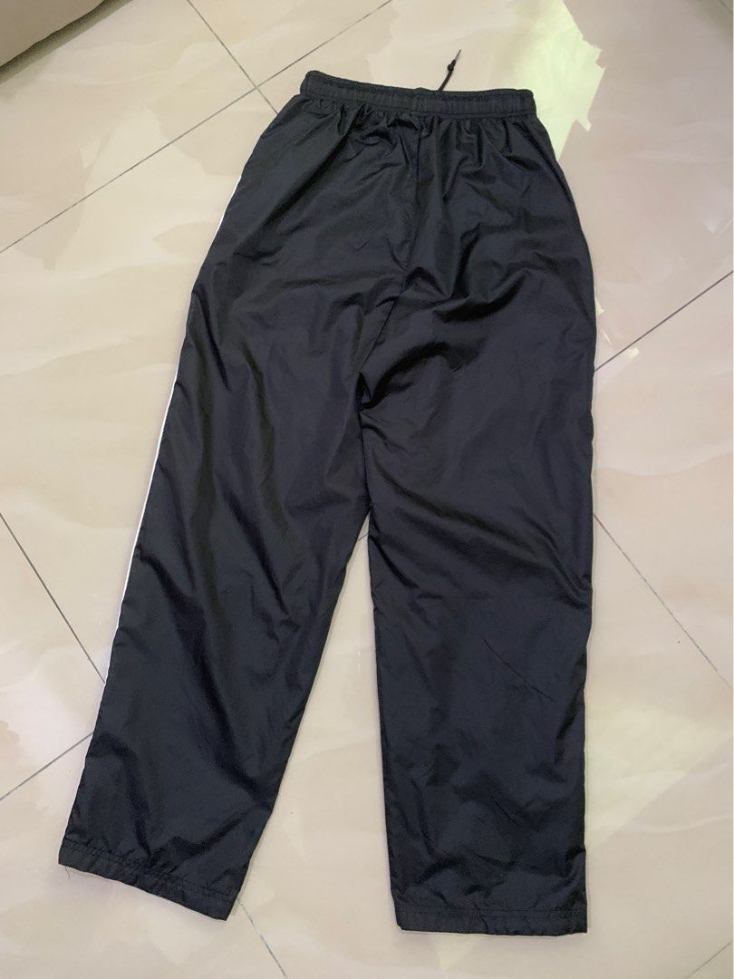 Nike waterproof track pants sale