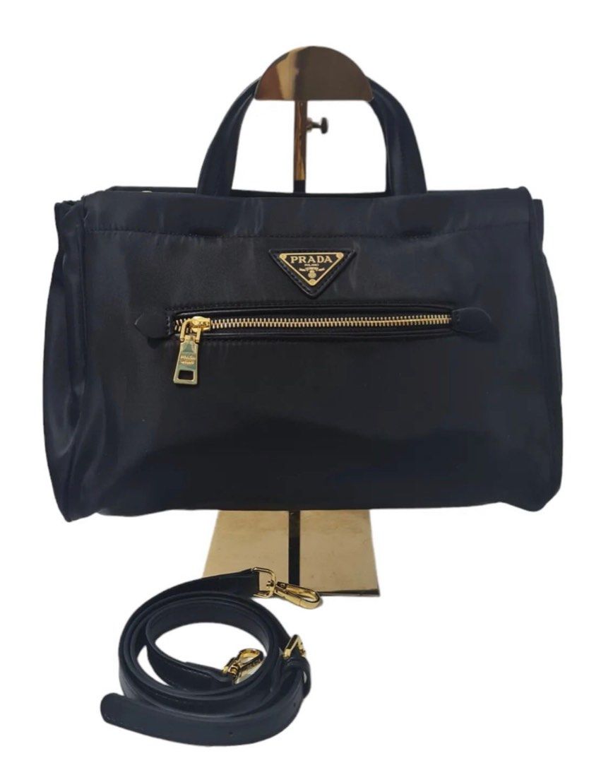 Preloved Prada Hand/Sling bag (Category: Luxury Bags & Wallets) located in Binan City. Submitted by mcsolis (Listing ID 1271581337, Image 1). Description: Japan ukay bags No flaws With dust bag and long strap NGA bags What you see is what you get.