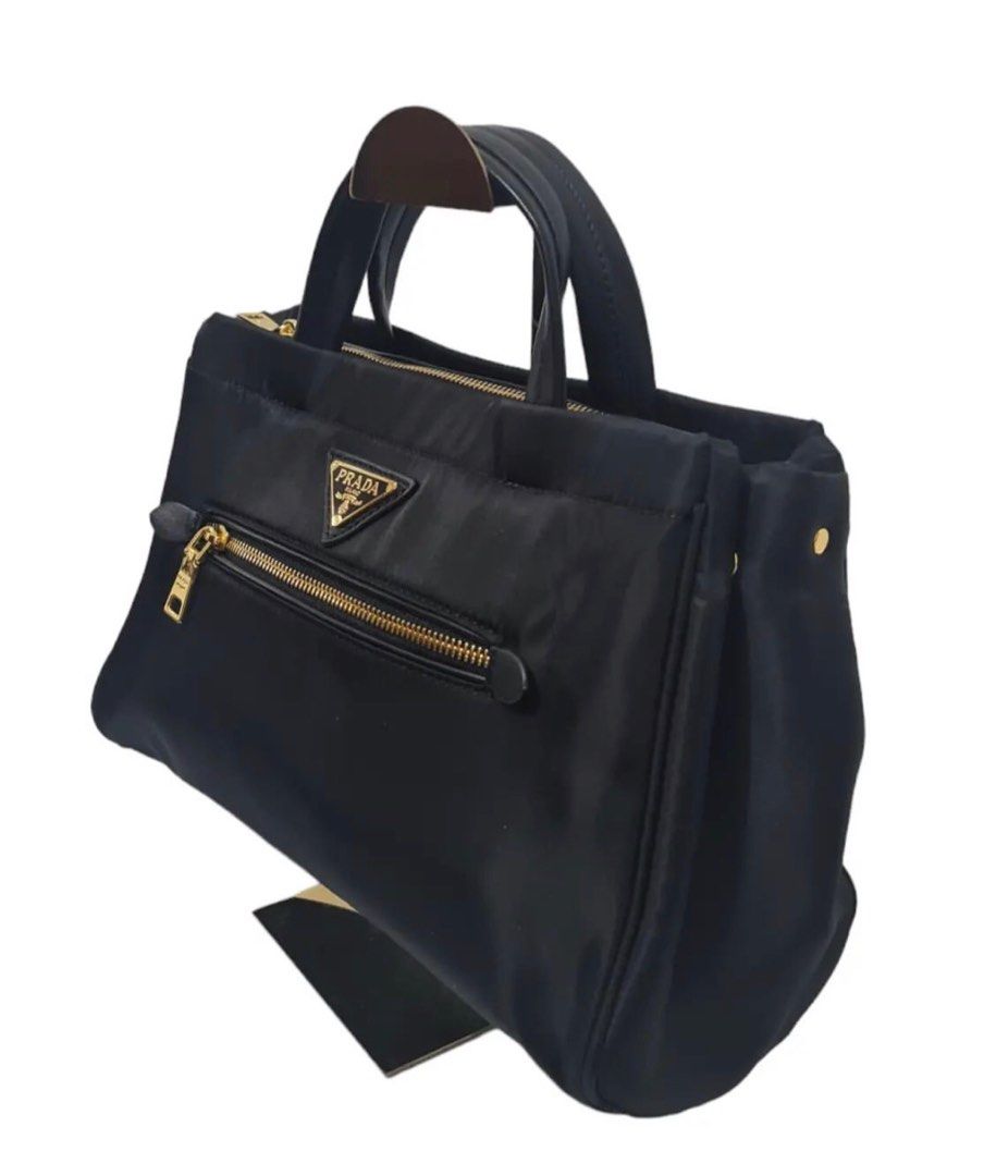 Preloved Prada Hand/Sling bag (Category: Luxury Bags & Wallets) located in Binan City. Submitted by mcsolis (Listing ID 1271581337, Image 3). Description: Japan ukay bags No flaws With dust bag and long strap NGA bags What you see is what you get.