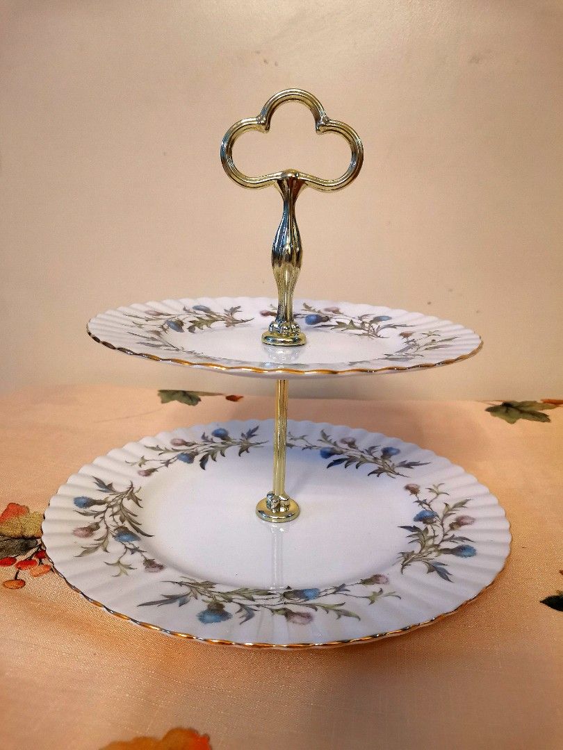Ra Brigadoon 2 tier large dessert stand (Category: Coffee & Tea Tableware) located in Pasig City. Submitted by singledadreseller (Listing ID 1271599953, Image 2). Description: Royal Albert Brigadoon Dessert stand Salad plate +dinner plate php3000 only very good condition.
