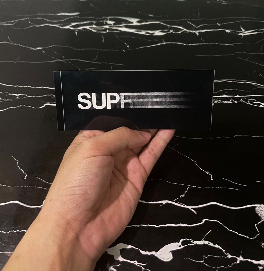 Supreme motion sticker on sale