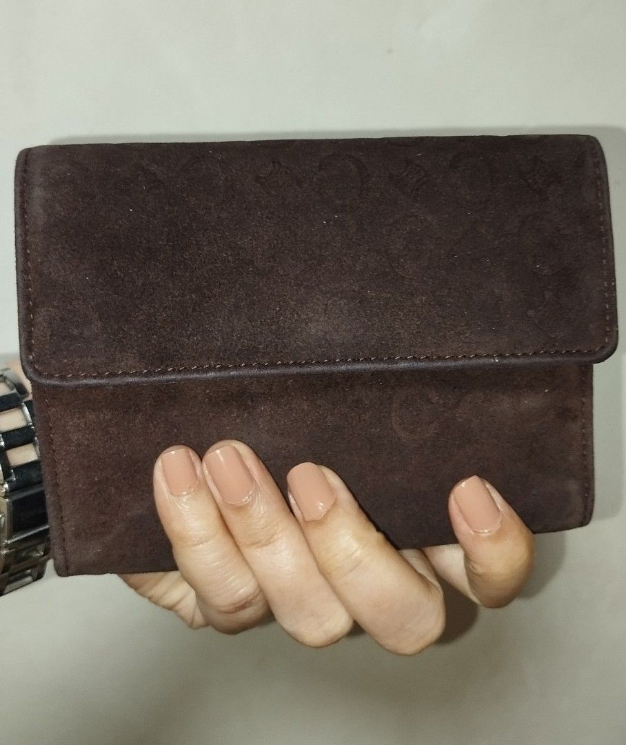 Vintage Celine C Embossed Suede Tri Fold Wallet (Category: Luxury Bags & Wallets) located in Taguig. Submitted by bellecabano (Listing ID 1271604605, Image 1). Description: Vintage Celine Suede Trifold Wallet ( see last photo as reference ) Made in Spain Coded 1.11 combination of Suede and genuine leather intact rubber lining, no lagkit or bakbak sa inner leather even sa coin or bills compartment 10/10 condition pa no rips and tears, no ink marks
