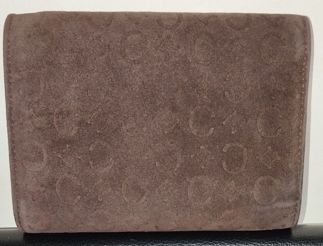 Vintage Celine C Embossed Suede Tri Fold Wallet (Category: Luxury Bags & Wallets) located in Taguig. Submitted by bellecabano (Listing ID 1271604605, Image 3). Description: Vintage Celine Suede Trifold Wallet ( see last photo as reference ) Made in Spain Coded 1.11 combination of Suede and genuine leather intact rubber lining, no lagkit or bakbak sa inner leather even sa coin or bills compartment 10/10 condition pa no rips and tears, no ink marks