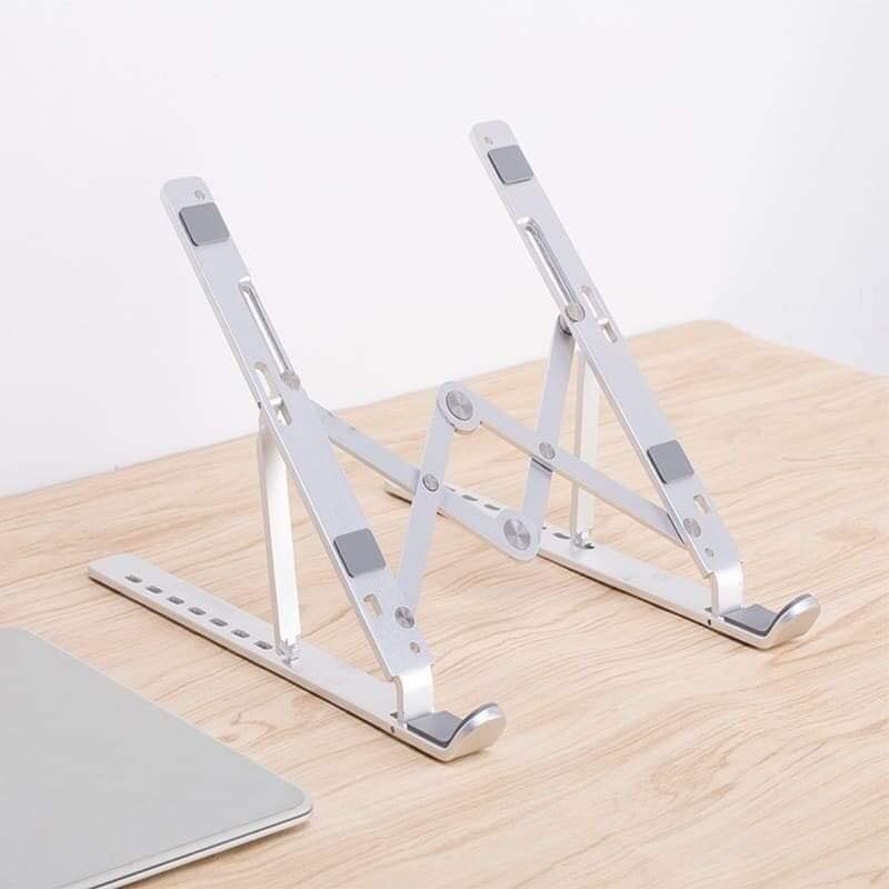 Zinc Alloy Laptop Stand (Category: Laptop Bags & Sleeves) located in Quezon City. Submitted by magicgerry (Listing ID 1271508445, Image 2). Description: Zinc Alloy Laptop Stand (P280.00) Adjust according to different table heights to find the most comfortable posture for you. > Model: SH-3111 > Capacity: 11.4Kg > Dimension: 29X26.5X32 .