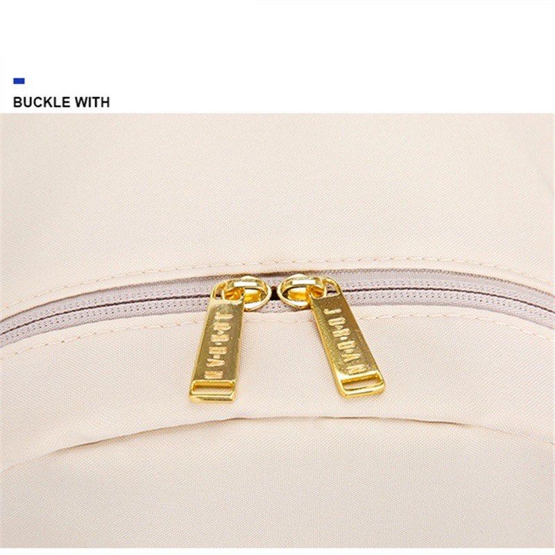 White and gold jordan backpack on sale