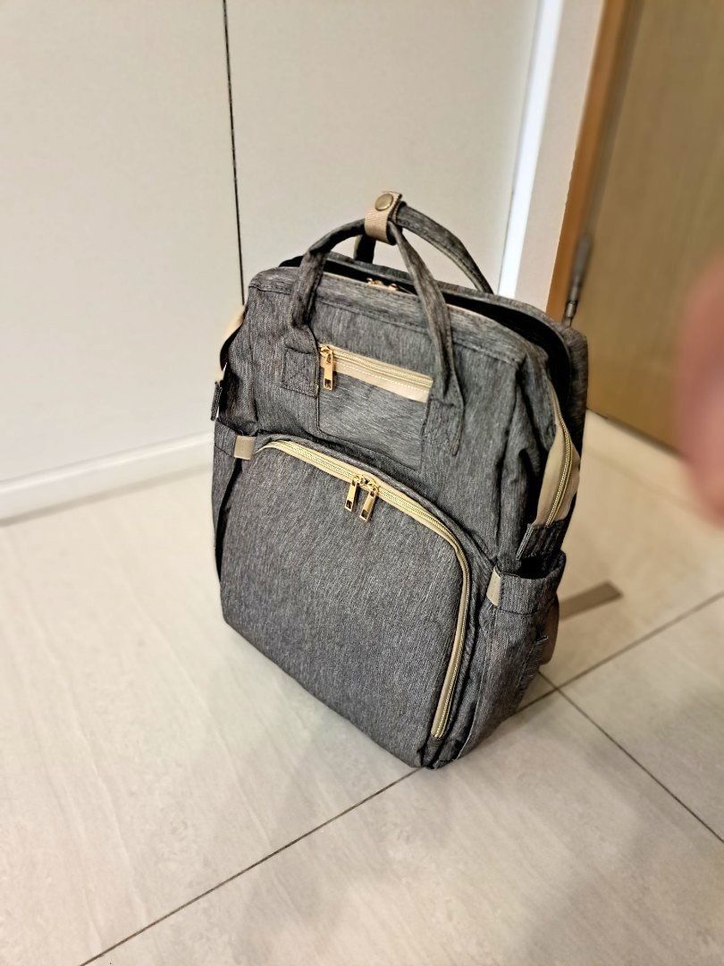 Diaper bag built in changing deals pad