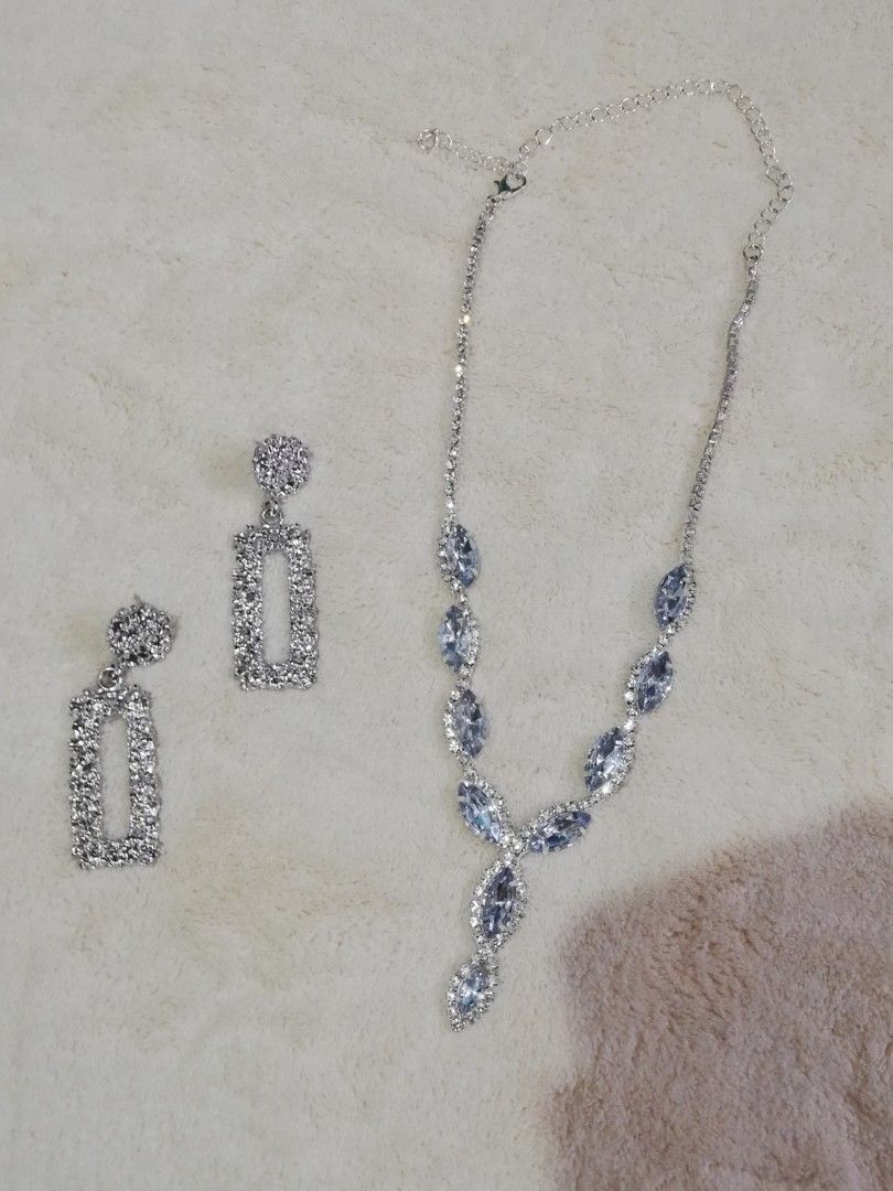 Elegant necklace and earrings (Category: Necklaces) located in Pasig City. Submitted by mryln (Listing ID 1271929311, Image 1). Description: Used only once The department store binili, high quality Suitable for evening party Pick up loc:Pasig SF shoulder by the buyer.