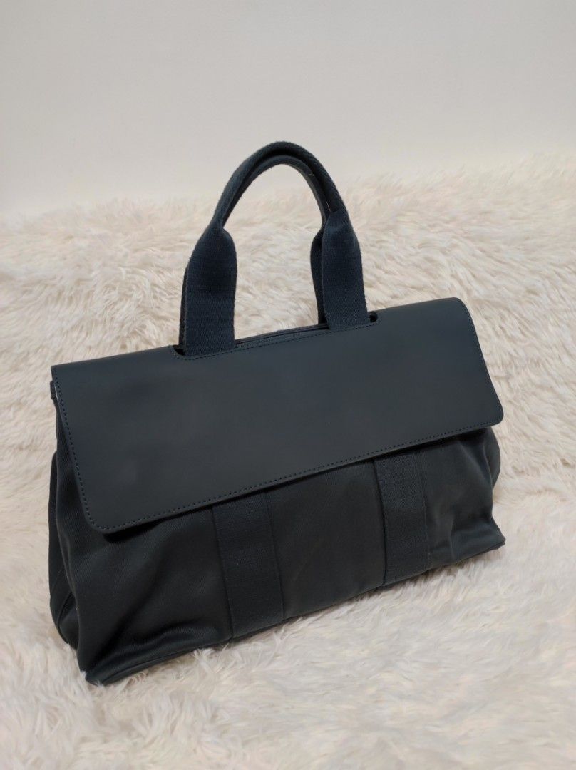 👛Hermes Valparaiso (Navy Blue) (Category: Luxury Bags & Wallets) located in Santa Rosa. Submitted by yerbua103 (Listing ID 1271904051, Image 1). Description: 👛This bag features a canvas body with leather trim, flat straps, a pull through front flap closure, snap closure, interior pockets and extra pouch. 👛Manage your expectations as you're buying a preloved item. 👛Color may vary due to lighting effects. Disclaimer: A2KOLSHOPPE is not affiliat