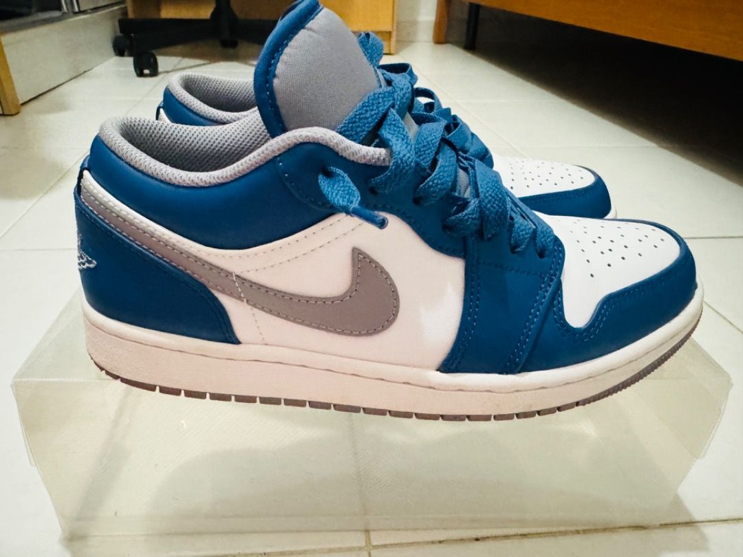 nipsey blue jordans