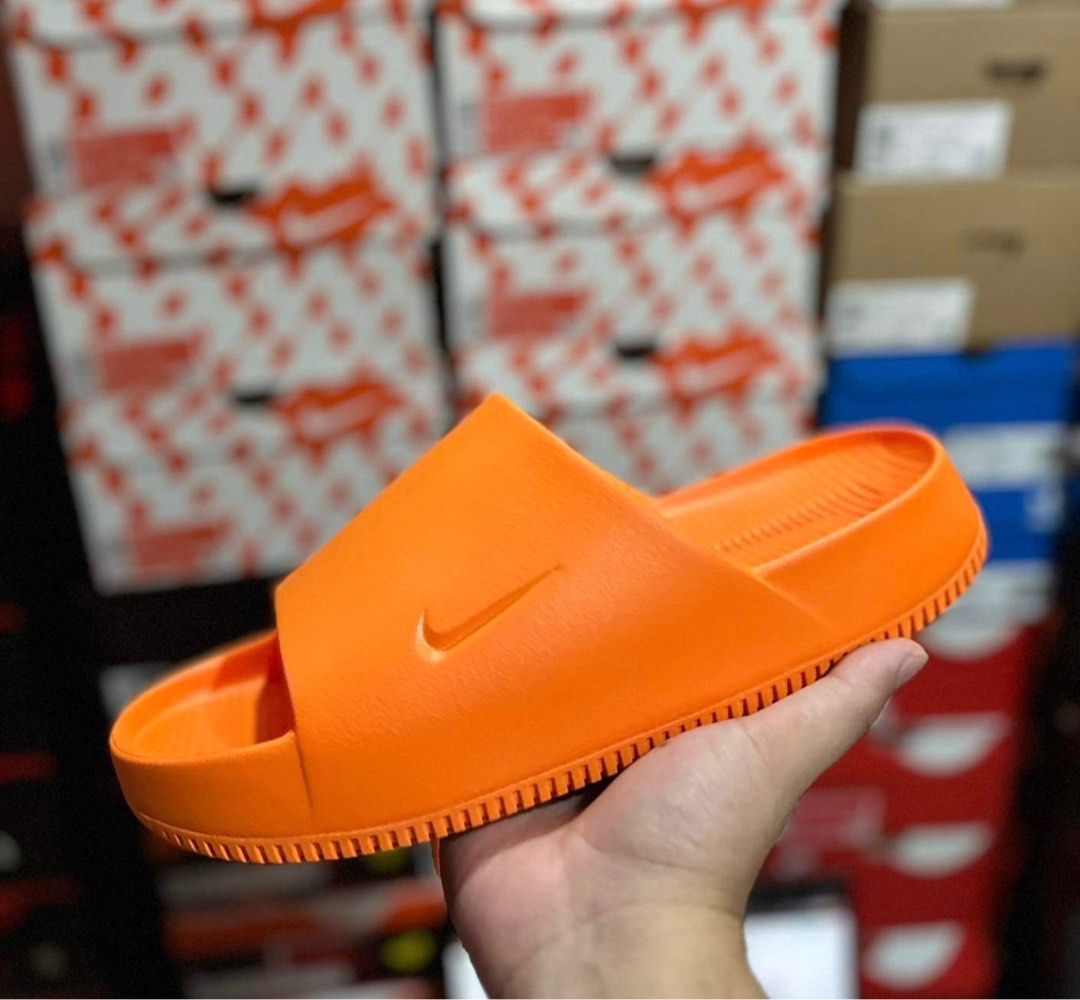Orange nike hotsell slides