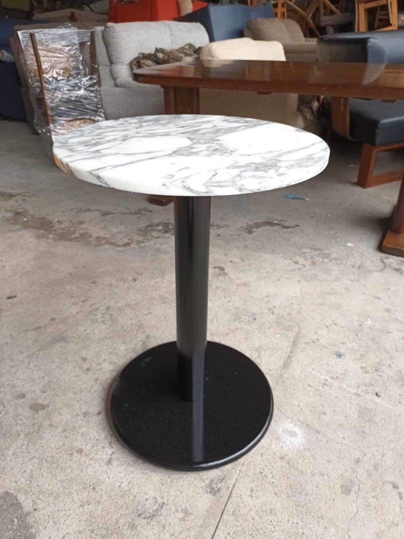 Round marble top outdoor table 19 1/2D x 28H inches In good condition, Furniture & Home Living