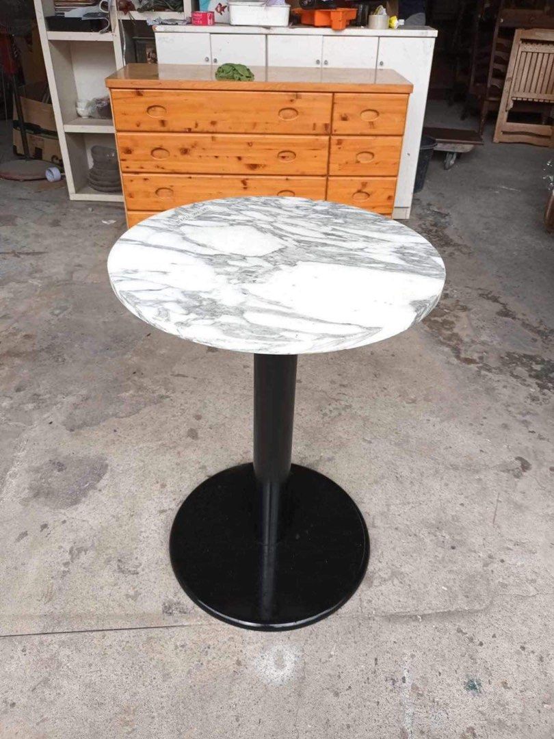 Round marble top outdoor table 19 1/2D x 28H inches In good condition, Furniture & Home Living