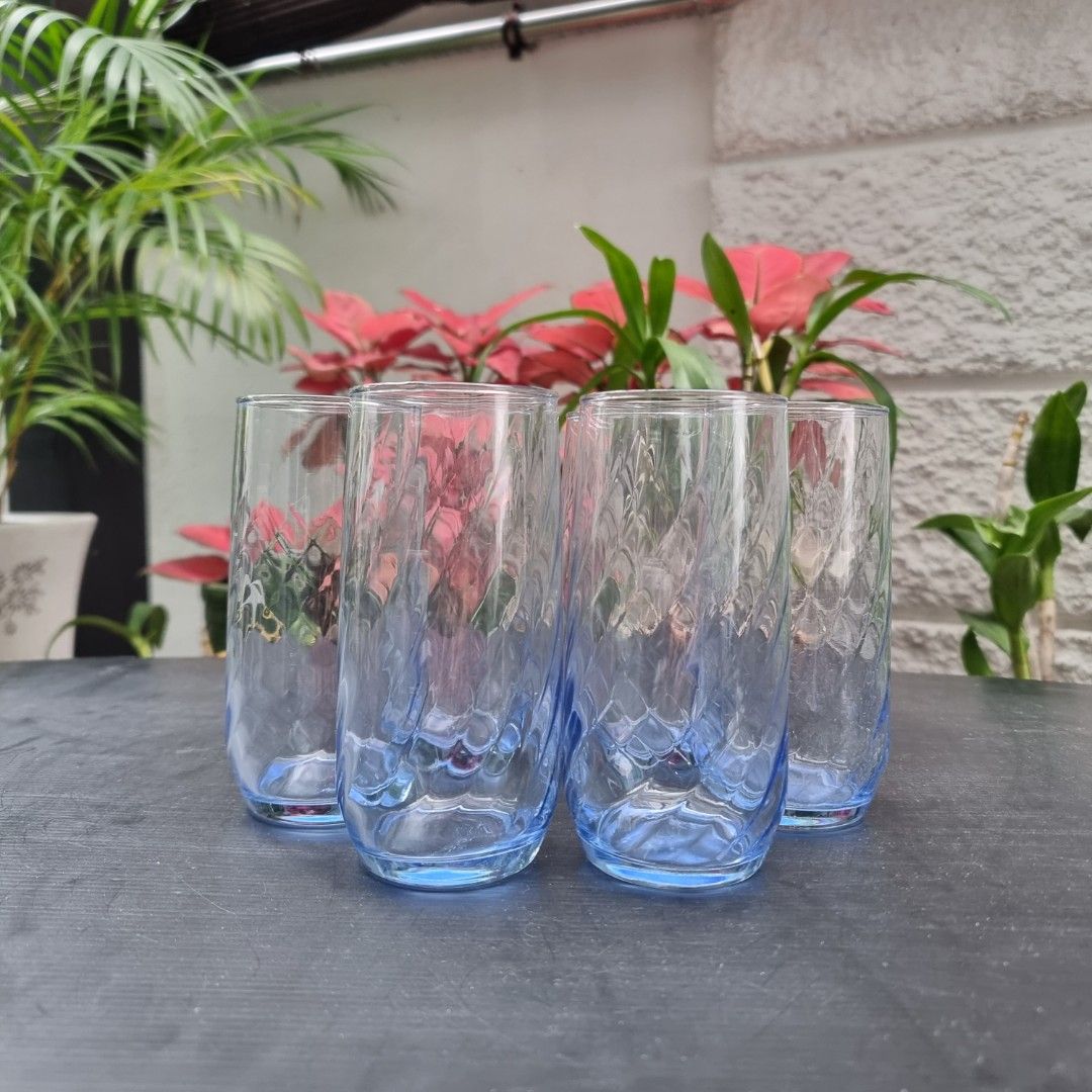 6 tall drinking glasses in blue tint