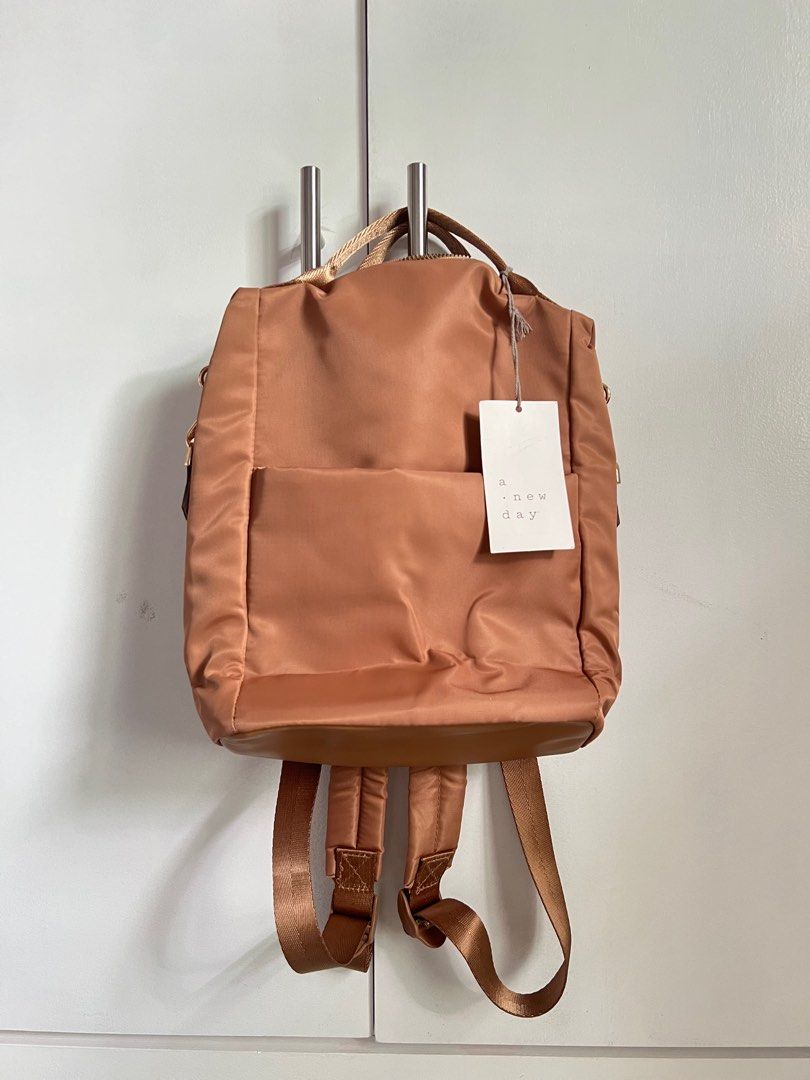 A new day. Mini Backpack