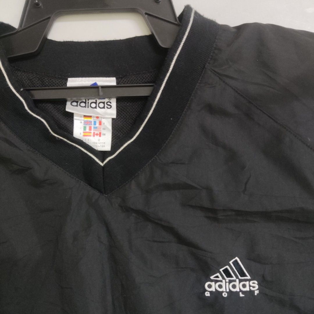 Adidas best sale golf windbreaker