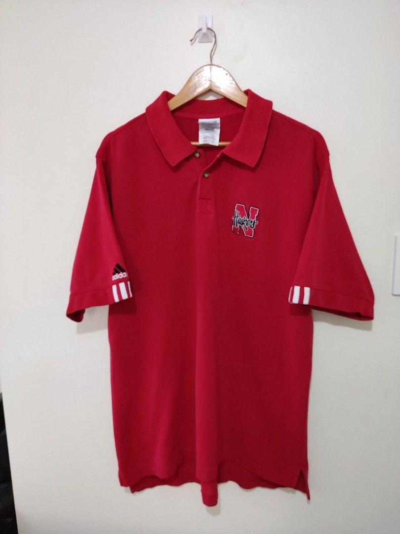 Adidas Huskers Polo shirt (Category: Tshirts & Polo Shirts ) located in Tarlac. Submitted by thrift_genius (Listing ID 1272116454, Image 1). Description: Item : Adidas Huskers Poloshirt Size: L Dimension: 23x30 Mine: 500.