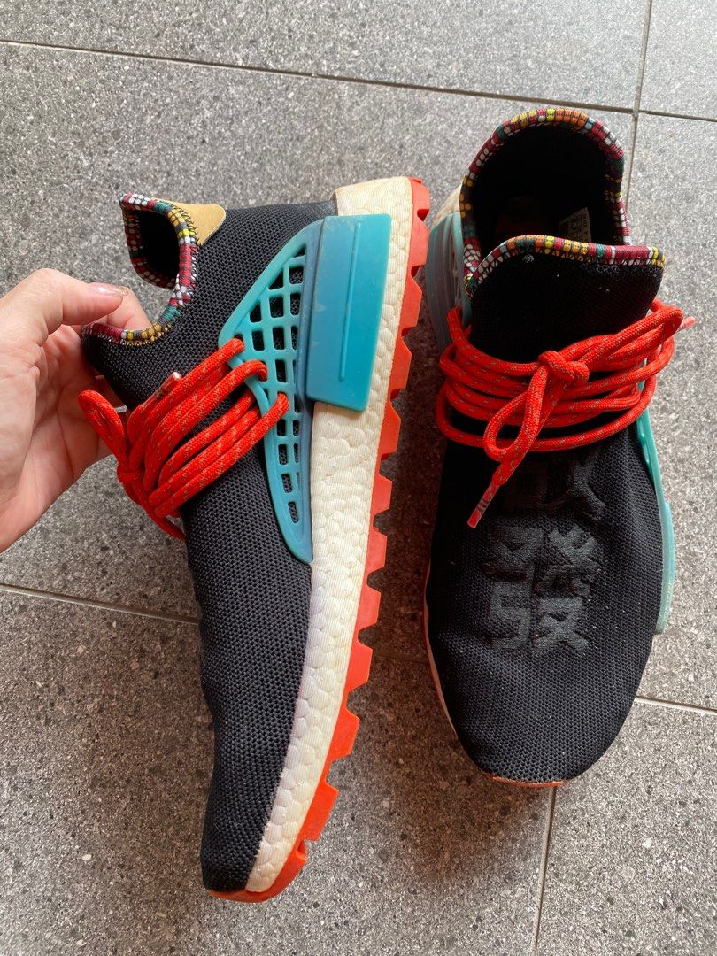 Red and black clearance human race nmd