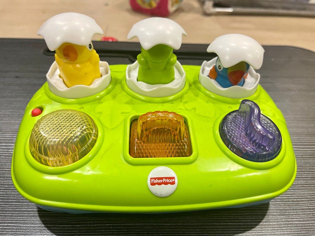 Fisher price musical pop up best sale eggs