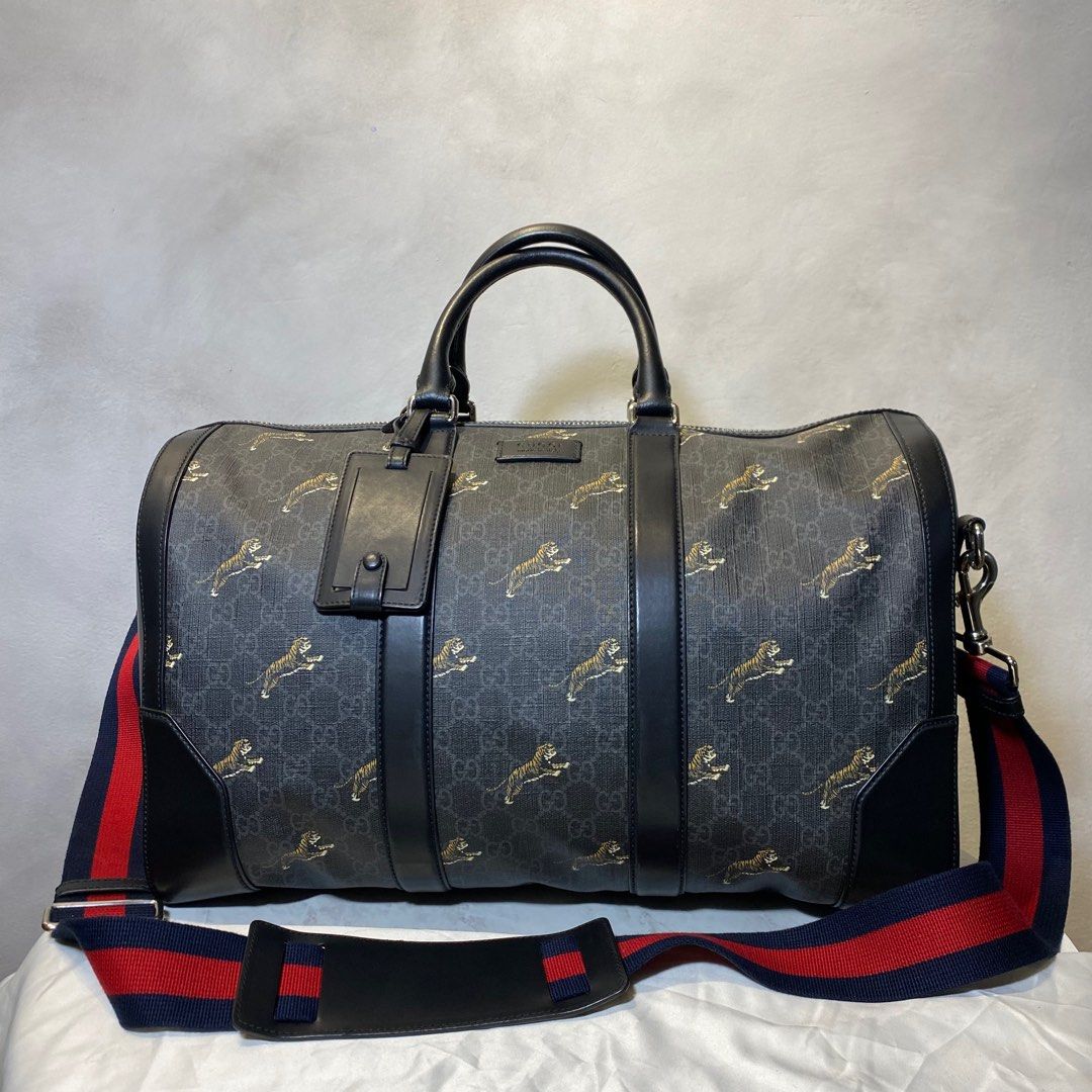 Gucci tiger sales duffle bag