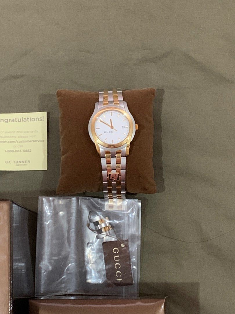 Authentic brand new in box Gucci watch gold and steel chain link bracelet. Swiss made. Water resistant