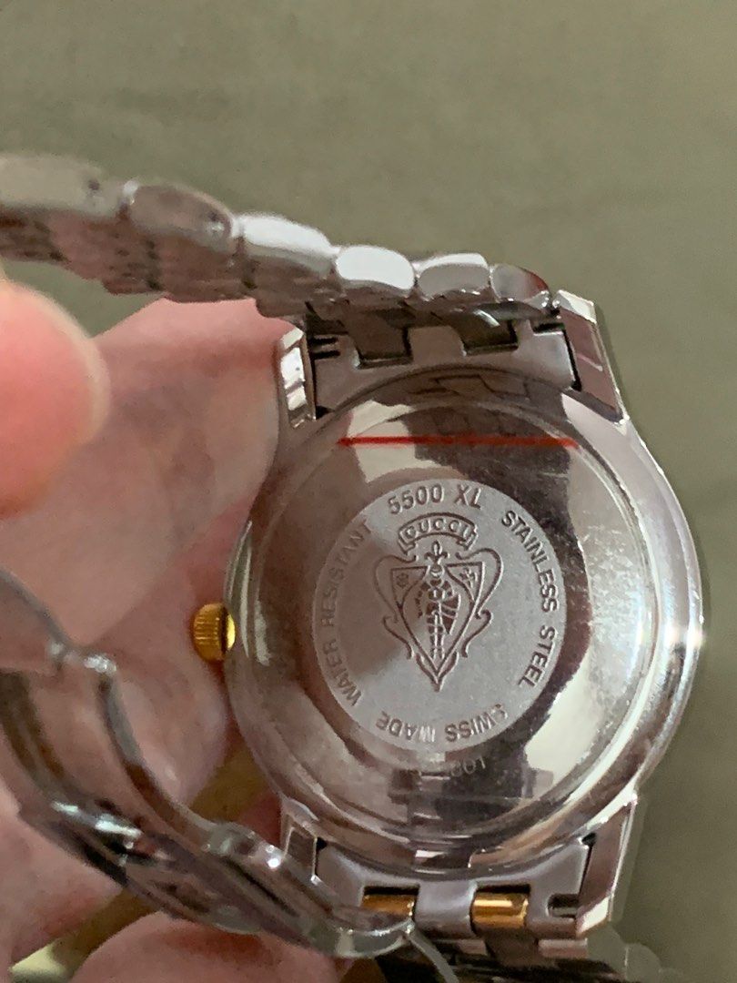 Authentic brand new in box Gucci watch gold and steel chain link bracelet. Swiss made. Water resistant