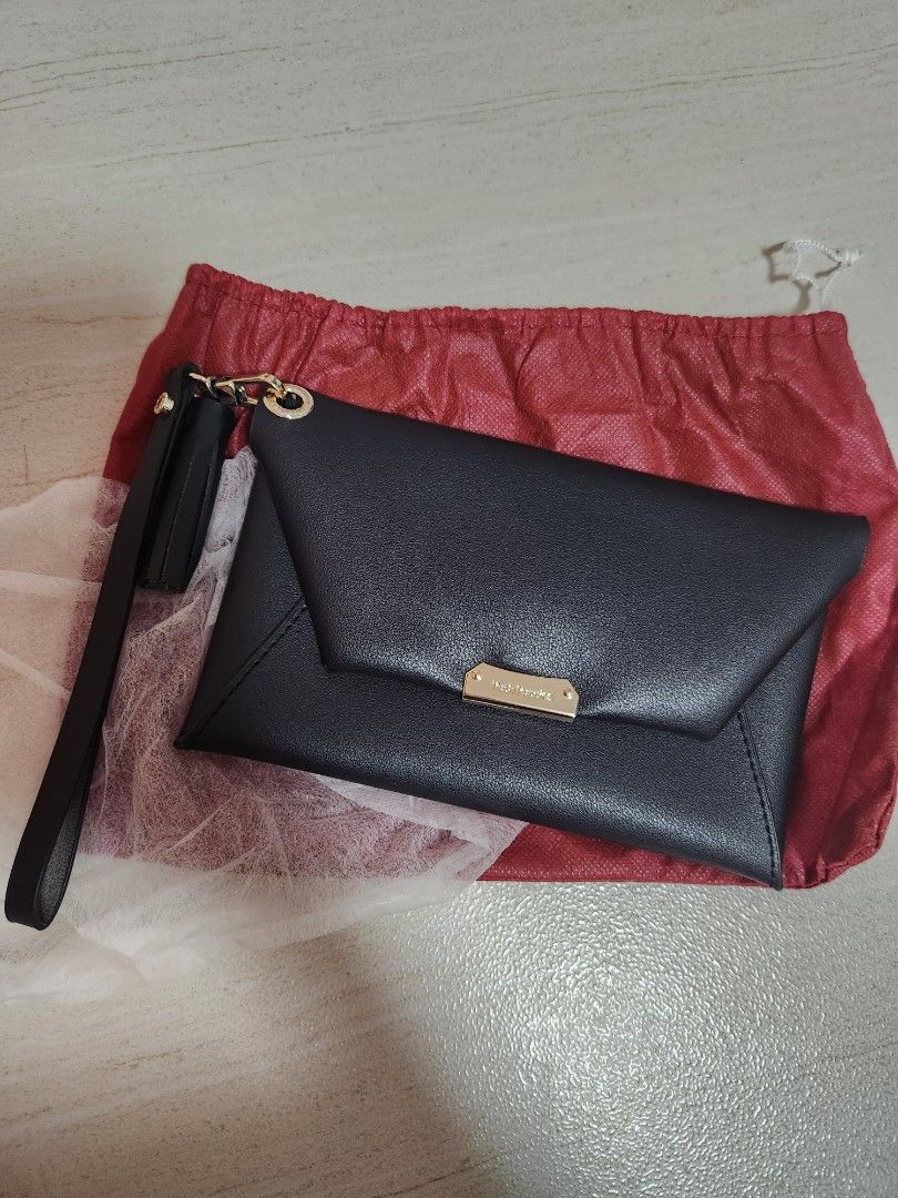 Hush puppies pouch bag store