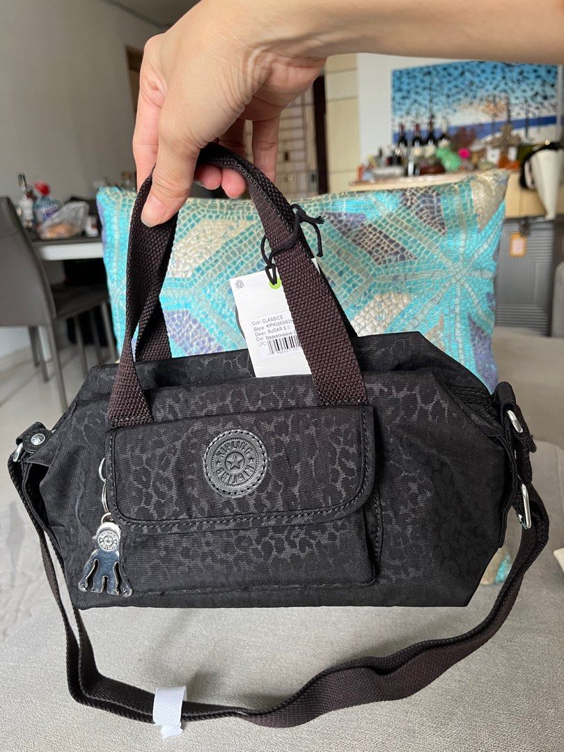Monkey handbag brand clearance
