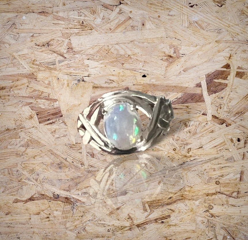 Pure opal outlet ring