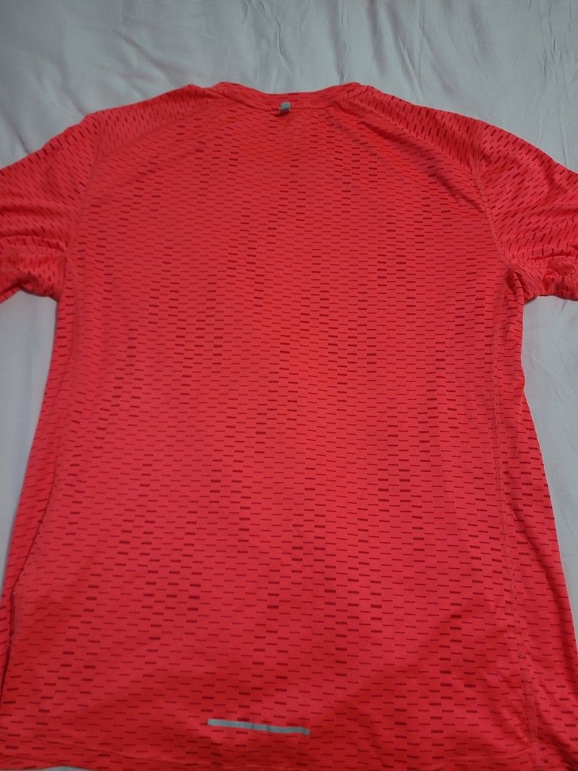 Red nike on sale running top