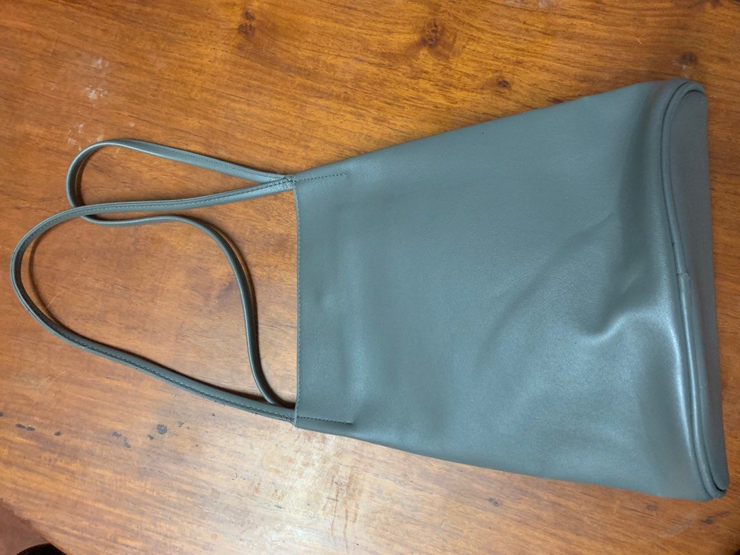 Taiwan bought Grey Leatherette Shoulder Bag (Category: Shoulder Bags) located in Manila. Submitted by little_brown_bag_ph (Listing ID 1272016409, Image 2). Description: Taiwan bought Shoulder Bag Material: Leatherette Colour: Grey Size: 12 x 10inches (refer to images) RFS: Decluttering Terms and Conditions: -Full cash payment upon confirming before delivery -Not Refundable and/or Exchangeable -All Sales are final -Delivery Fee NOT included -No In