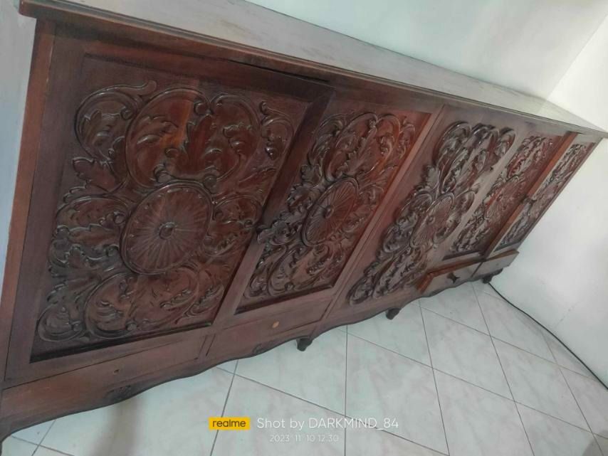 Vintage Narra Display and Plates Cabinet (Category: Shelves, Cabinets & Racks) located in Quezon City. Submitted by lexy1402 (Listing ID 1272132014, Image 1). Description: Vintage Narra Display and Plates Cabinet - Antique Narra with sculpture - Dimension: 8 feet (length) x 4 feet (height) - Selling at P48,000 • Payment mode: Bank Transfer or GCash • Shipping fee: c/o Buyer .