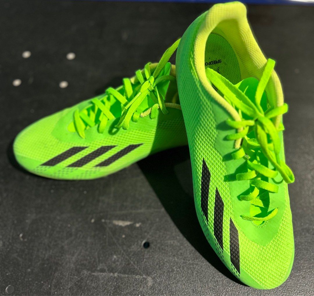 Lime green best sale football boots