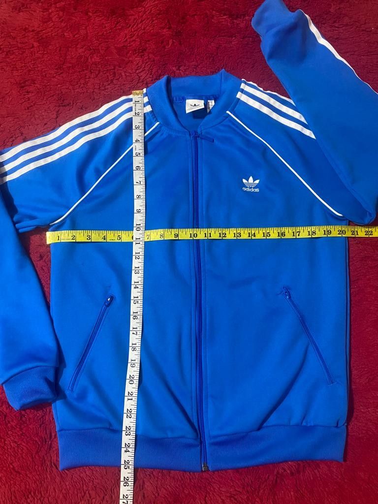 Adidas sst track top blue hotsell