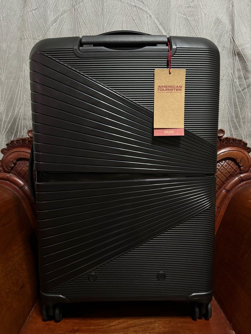 American Tourister Medium Sized Luggage, Hobbies & Toys, Travel