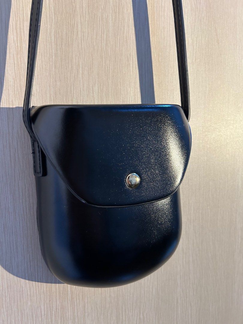 Glossy sling bag deals